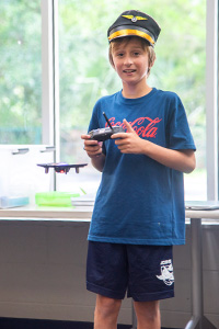 boy flying drone