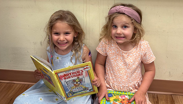 young girls reading books