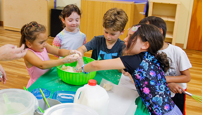 kids mixing dough