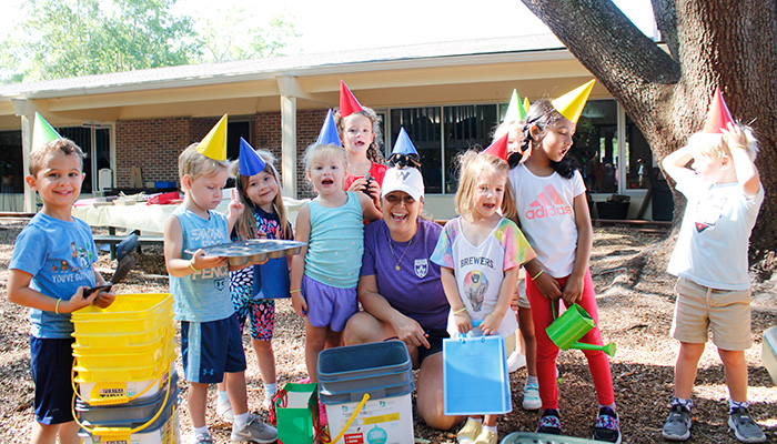 group of kids wearing cone hats