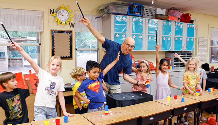 kids practicing with magic wands